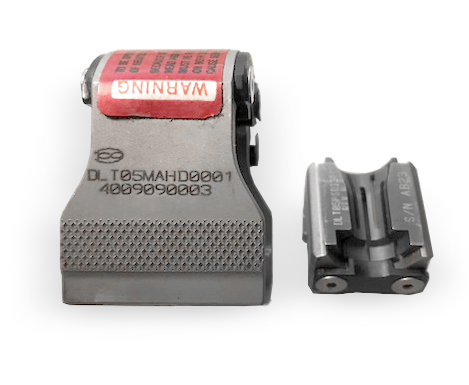 A close-up of two industrial rubber date stamps with visible inscriptions and brand markings.